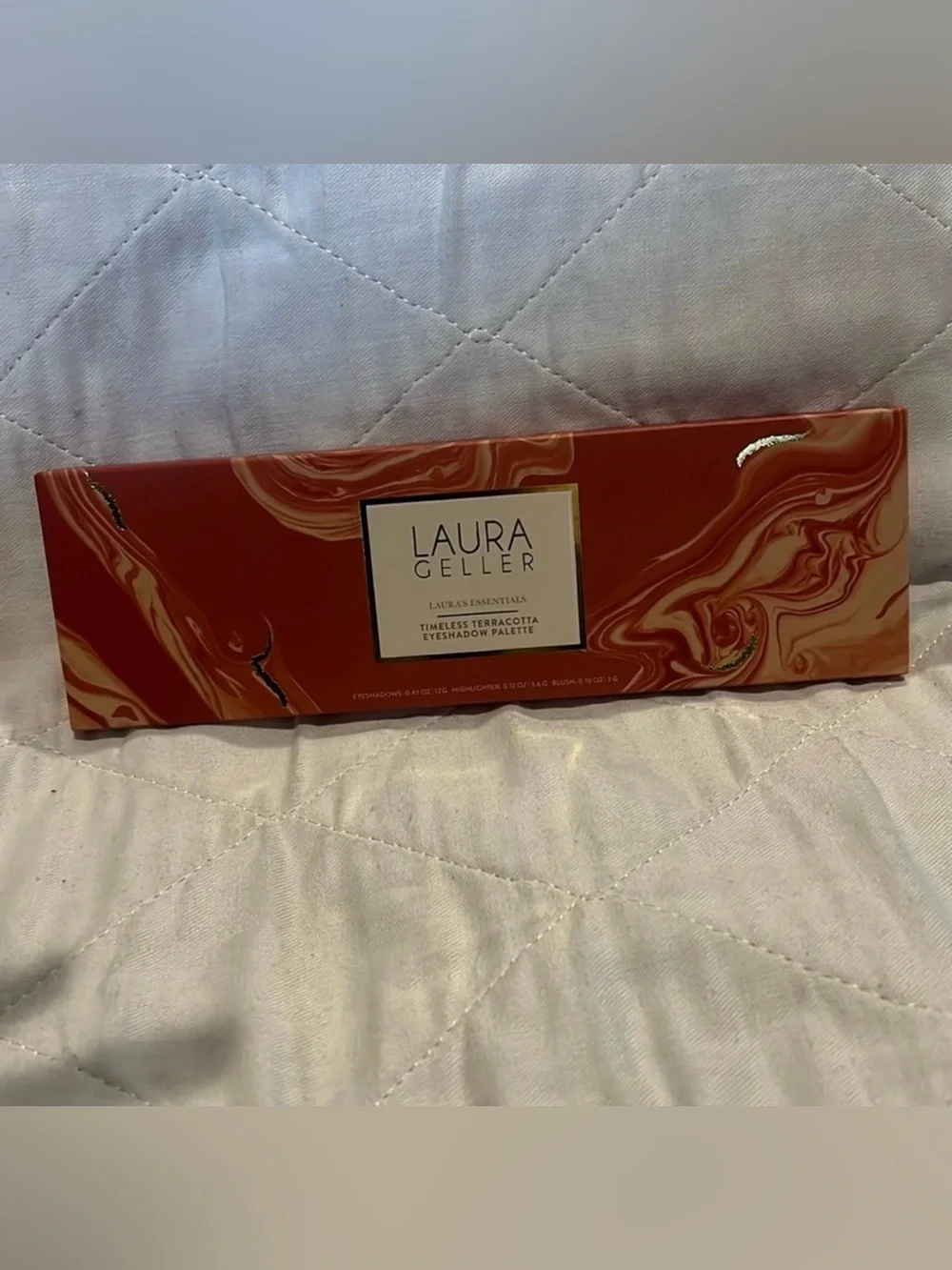 Laura Geller tones finish details